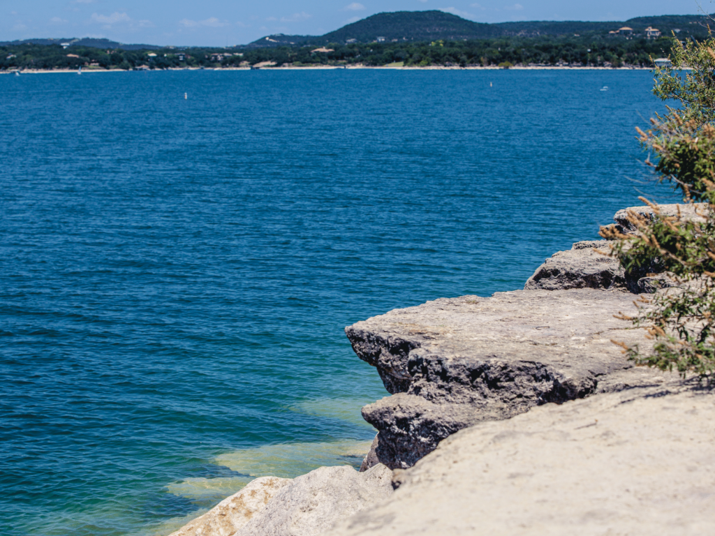 the rocky shores of canyon lake, where is laura traveling, swimming hole near austin