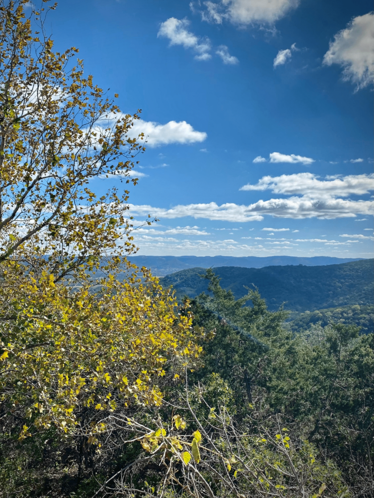 Hill Country mountain views, where is Laura traveling