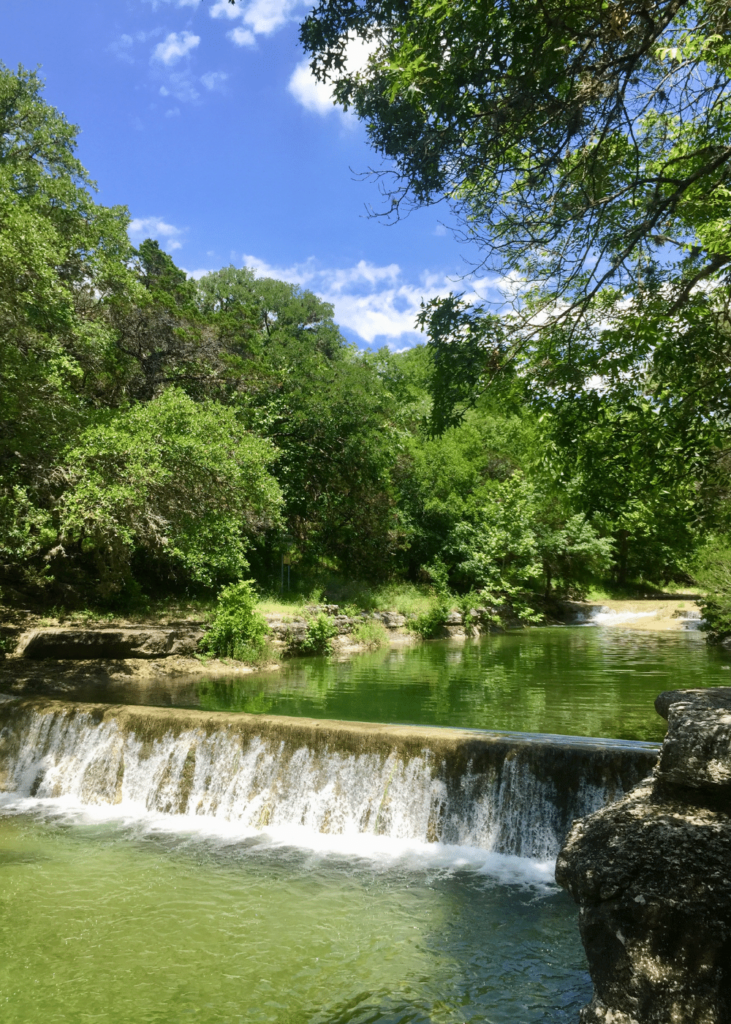 swimming holes near Austin, where is laura traveling