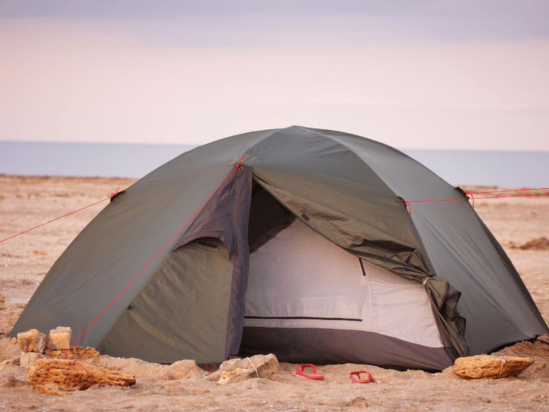 camping on the beach, where is laura traveling